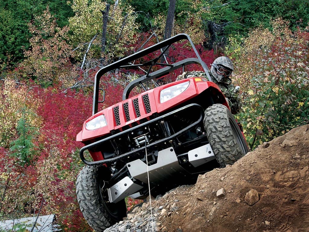 2010.arctic-cat.prowler.red_.front_.using-winch.pulling-uphill.jpg